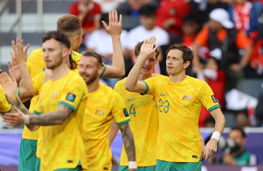 Australia's Craig Goodwin celebrating a goal with teammates