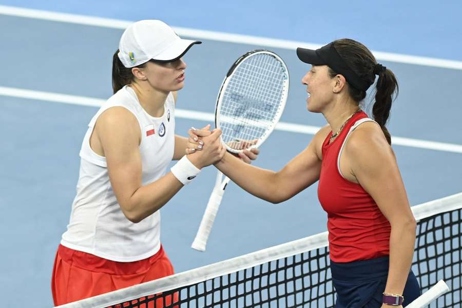 Jessica Pegula of the US shakes hands with Poland's Iga Swiatek after the match