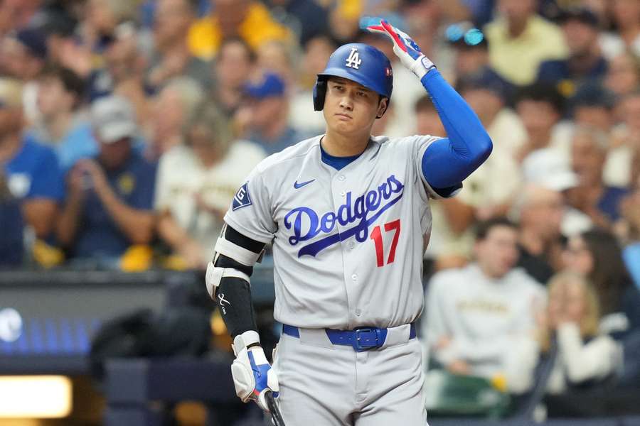 Shohei Ohtani walks to the plate in Game 1 of NLCS against Milwaukee Brewers Shohei Ohtani walks to the plate in Game 1 of NLCS against Milwaukee Brewers