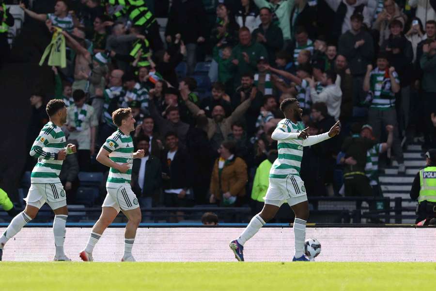 Celtic's players celebrate their win