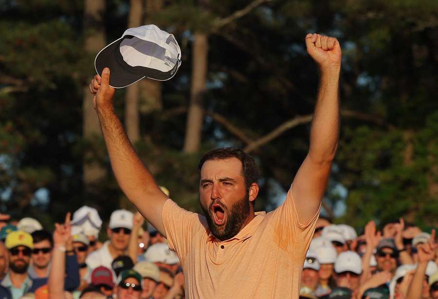 Scottie Scheffler celebrates on the 18th green after winning The Masters