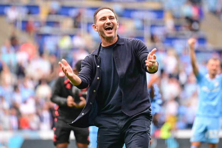 A smiling Coventry City manager Frank Lampard celebrates victory