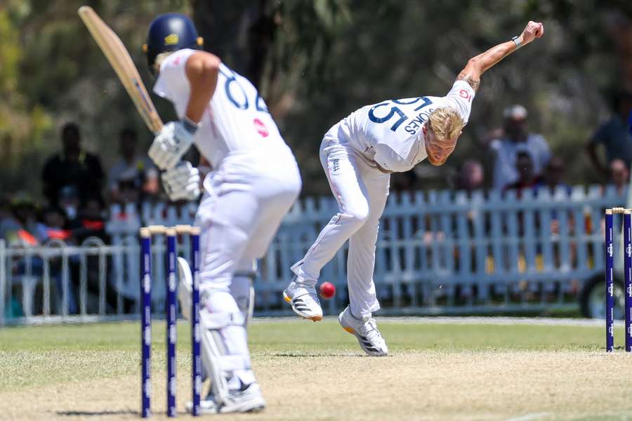 Ben Stokes bowls during the Ashes tour warm-up match between England and England Lions XI