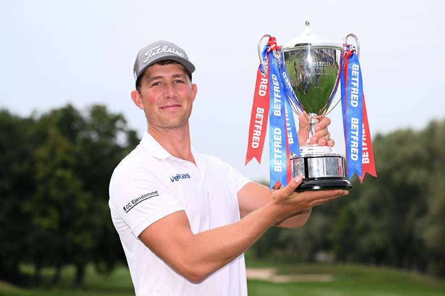 Niklas Norgaard lifts the British Masters trophy