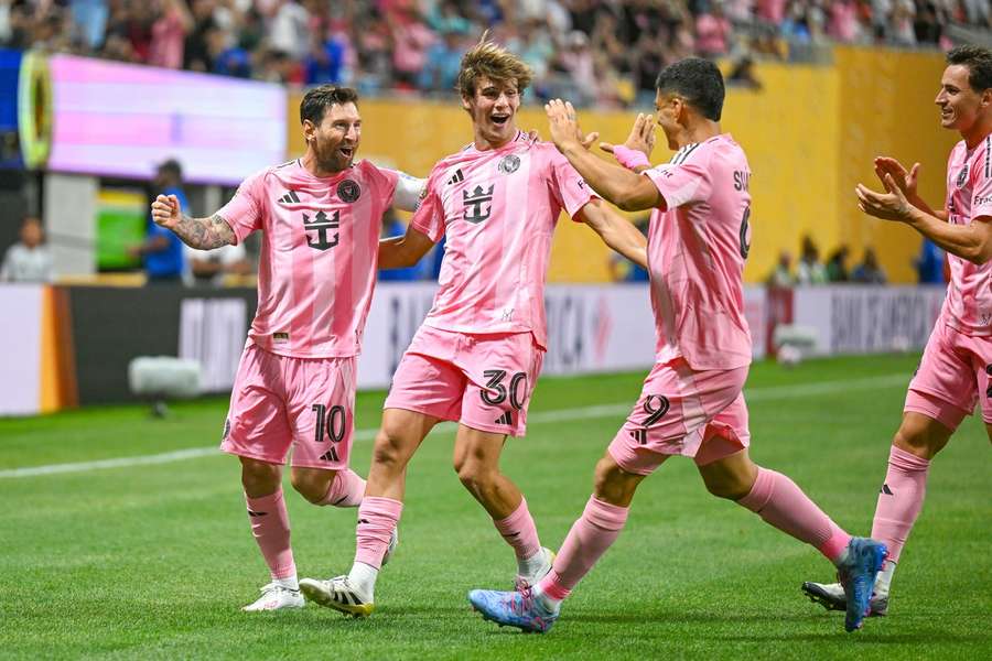 Lionel Messi, Benjamin Cremaschi and Luis Suarez celebrate during the FIFA Club World Cup match against Porto