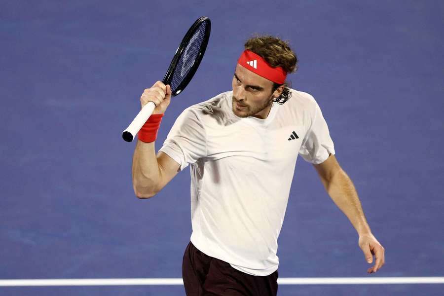 Stefanos Tsitsipas celebrates after winning his round of 32 match against Italy's Lorenzo Sonego 