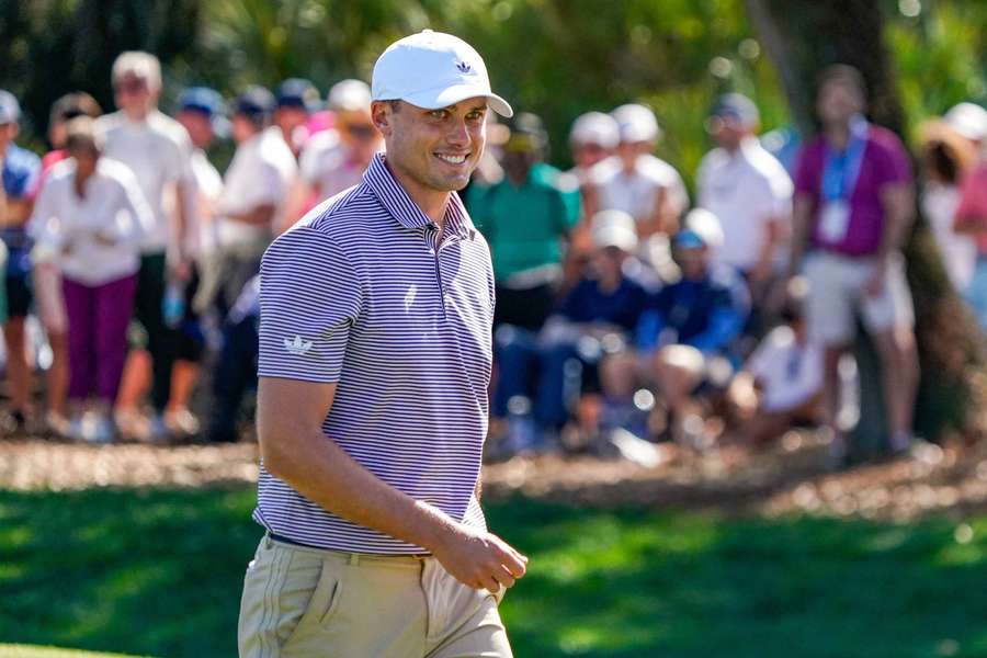 Ludvig Aberg acknowledges the crowd
