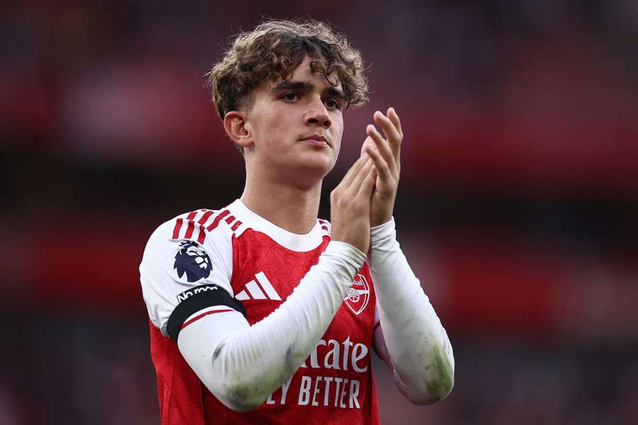 Max Dowman applauds the fans after the end of his Arsenal debut, aged just 15, in a 5-0 Premier League win over Leeds