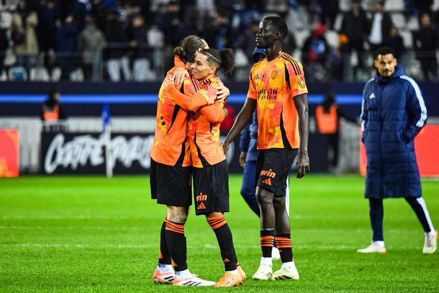 Paris FC's players celebrate against Lyon Paris FC's players celebrate against Lyon