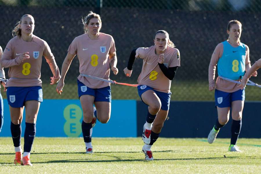 England's Millie Bright with Beth Mead, Grace Clinton and Keira Walsh during training