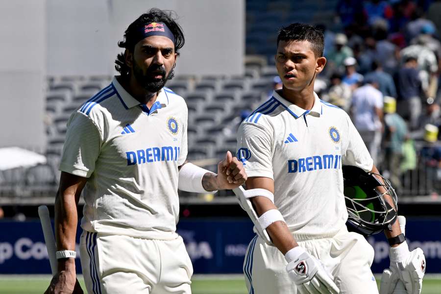 India's Yashasvi Jaiswal (R) and KL Rahul walk back to the dressing room