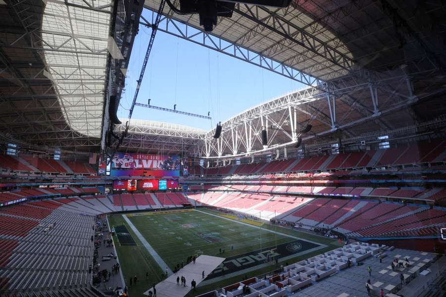 Crews prepare the field for Super Bowl LVII in Glendale, Arizona