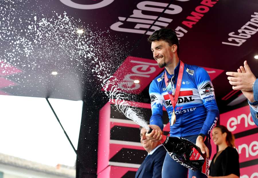 Alaphilippe celebrates on the podium after winning stage 12