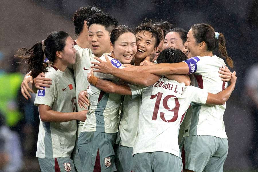 China celebrate Chen Qiaozhu's goal