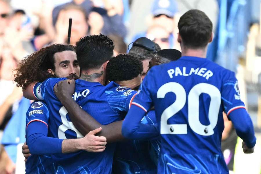 Marc Cucurella celebrates with teammates after scoring the winning goal