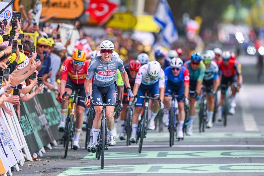 Alpecin-Deceuninck's Jasper Phillipsen celebrating his win
