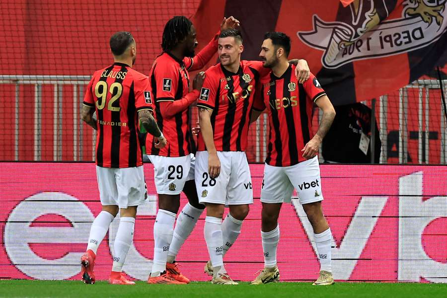 Gaetan Laborde, right, celebrates with teammates after scoring a penalty  for Nice