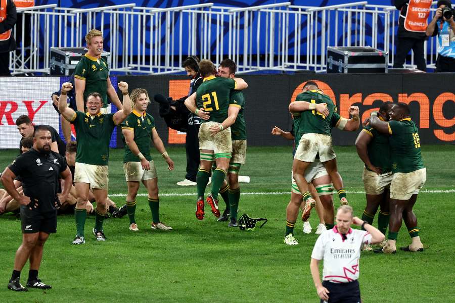 South Africa players celebrate at full time as they win the World Cup final