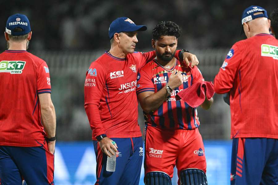 Lucknow head coach Justin Langer embraces captain Rishabh Pant. Lucknow head coach Justin Langer embraces captain Rishabh Pant.