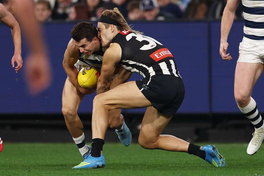 Oisin Mullin and Darcy Moore clash heads during a Round 9 game in May. Oisin Mullin and Darcy Moore clash heads during a Round 9 game in May.