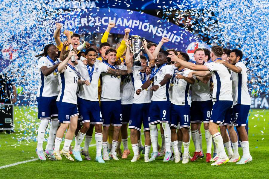 England celebrate with their trophy