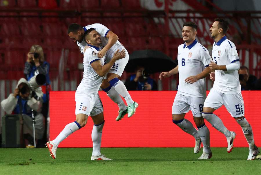 Serbia celebrate their opening goal