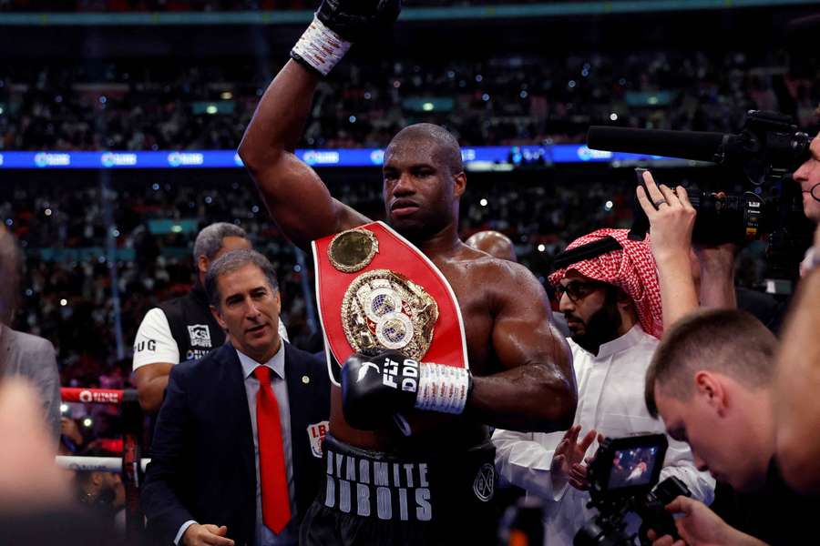 Daniel Dubois celebrates after winning his fight against Anthony Joshua