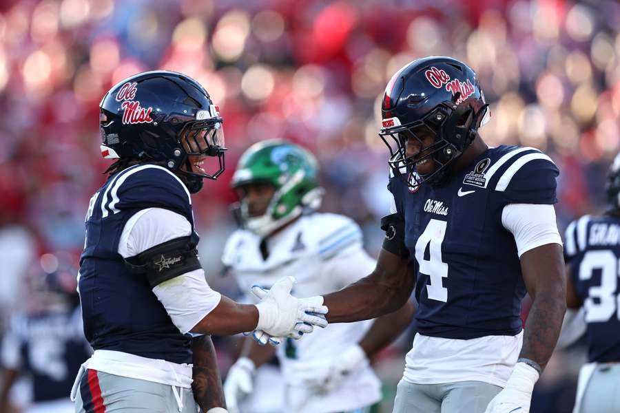 Ole Miss' TJ Dottery and Suntarine Perkins (right) celebrate during win over Tulane in 2025 College Football Playoffs Ole Miss' TJ Dottery and Suntarine Perkins (right) celebrate during win over Tulane in 2025 College Football Playoffs