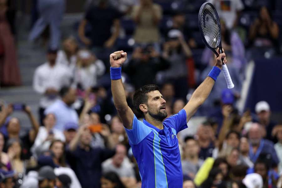 Djokovic celebrates after reaching the quarter-finals
