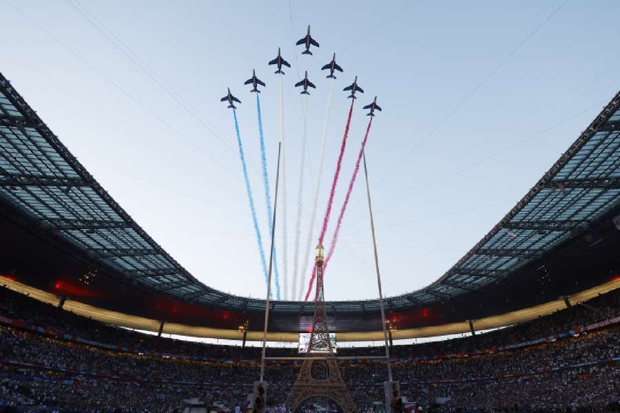 Planes are pictured flying over Stade de France during the opening ceremony