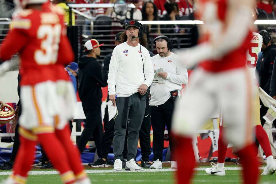 San Francisco 49ers' head coach Kyle Shanahan speaks with his players during their Super Bowl loss to the Kansas City Chiefs