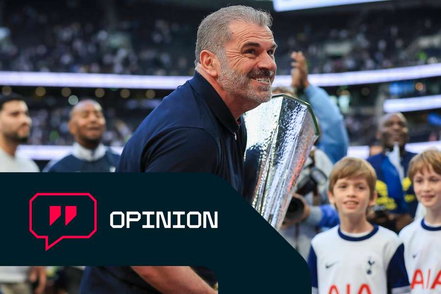 Ange Postecoglou with the Europa League trophy on the final day of the Premier League season