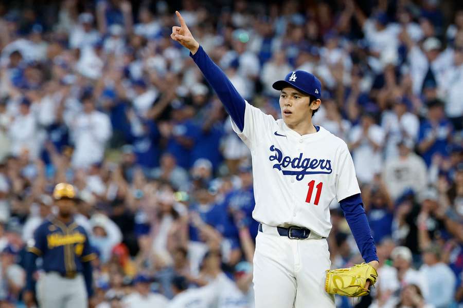 Dodgers' Roki Sasaki reacts after winning Game 3 of the NLDS against the Milwaukee Brewers