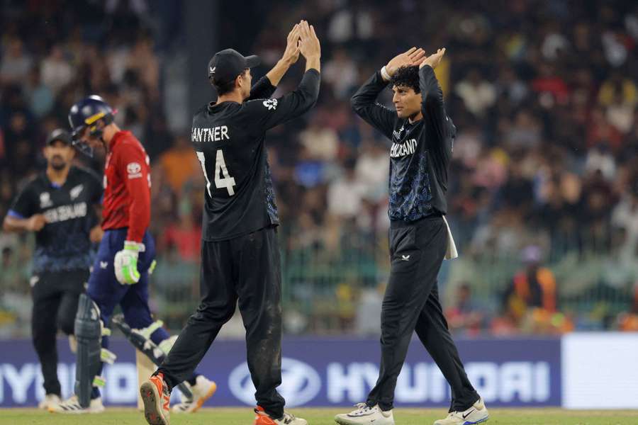 Mitchell Santner, left, alongside Rachin Ravindra during the Super Eights phase of the competition
