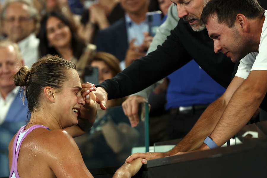 Aryna Sabalenka celebrates victory with teammates after defeating Kazakhstan's Elena Rybakina in the women's singles final match on day thirteen of the Australian Open 