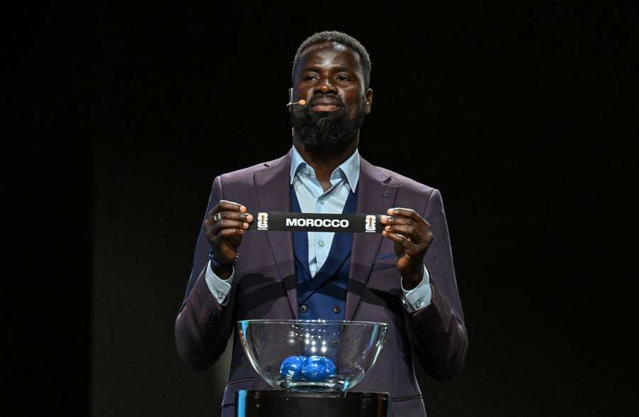 Former Arsenal and Ivorian footballer Emmanuel Eboue assisted with the draw