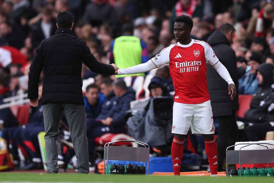 Saka is remaining grounded in the Premier League title race