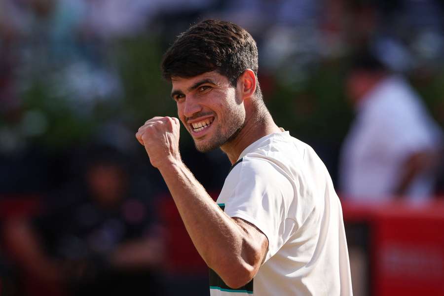 Carlos Alcaraz celebrates beating Roberto Bautista-Agut