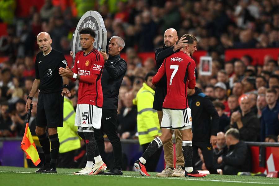 Jadon Sancho of Manchester United is substituted on as Mason Mount of Manchester United comes off during the Premier League match between Manchester United and Wolverhampton Wanderers
