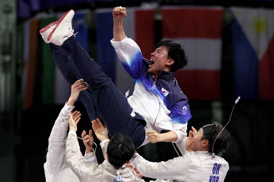 -South Korea celebrate their gold medal