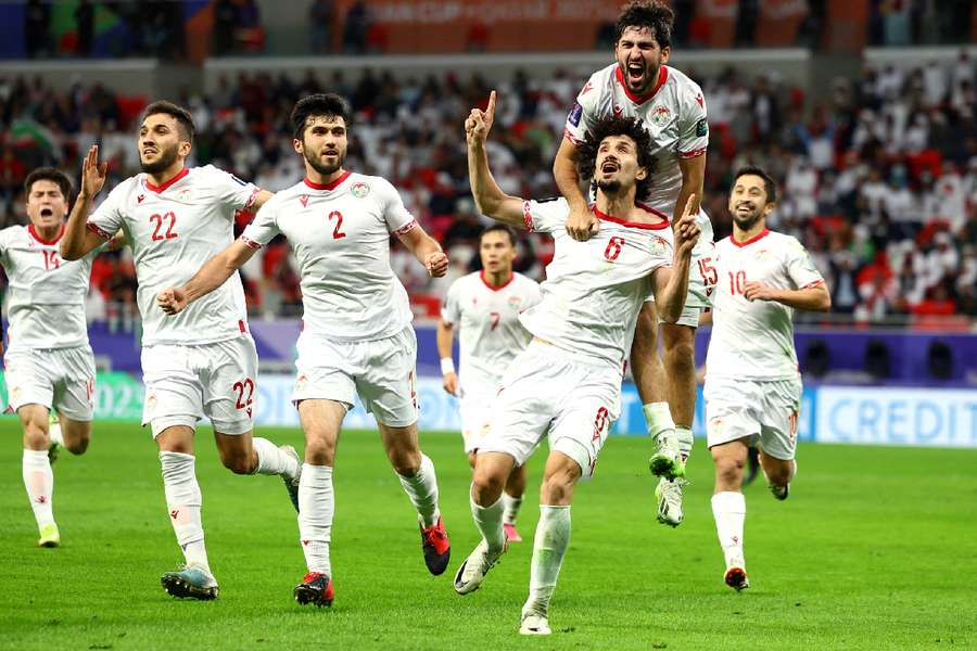 Tajikistan celebrate their opening goal