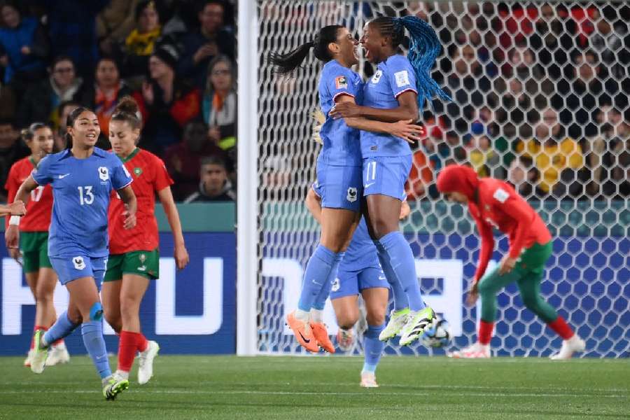 French players celebrate in the first half