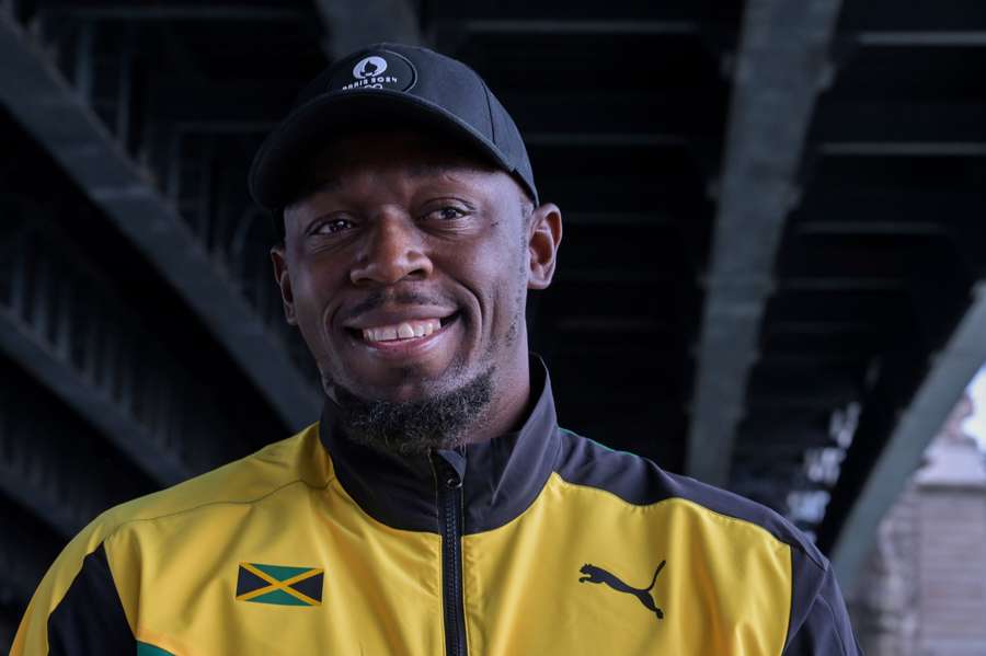 Usain Bolt a assisté à la présentation de la flamme olympique.