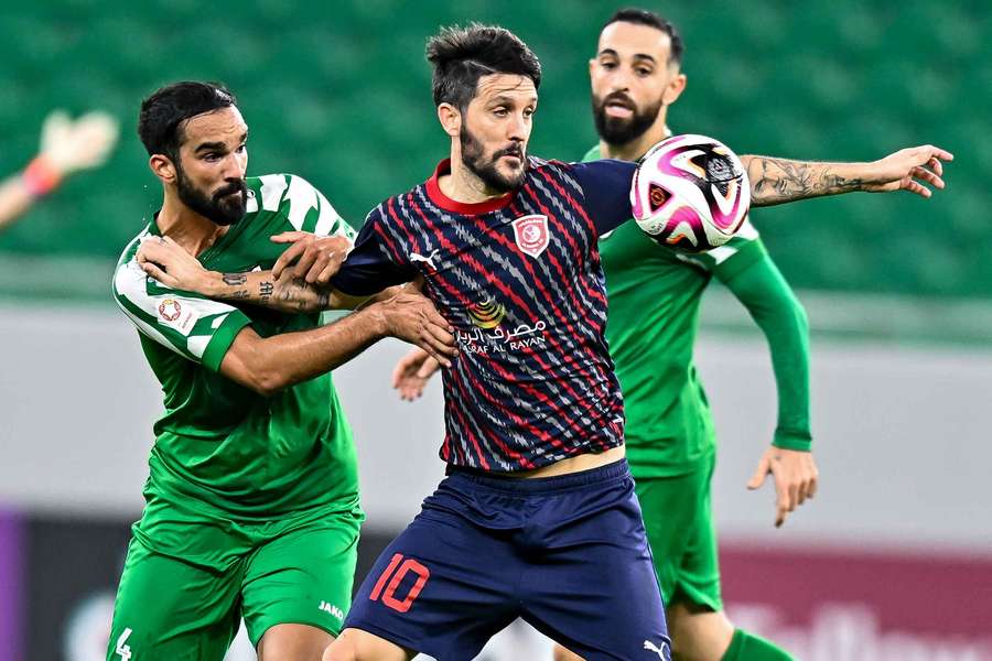 Luis Alberto (centre) in action for Al-Duhail in Qatar