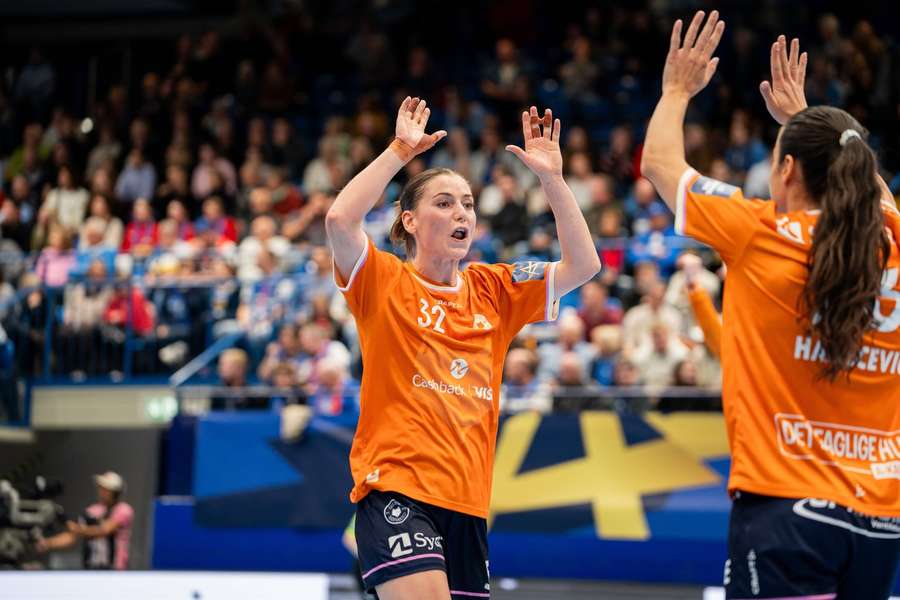 Mie Hojlund celebrates with teammates after securing the win over Blomberg-Lippe Mie Hojlund celebrates with teammates after securing the win over Blomberg-Lippe