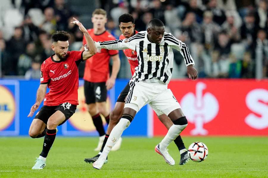 Randal Kolo Muani, right, battles with Rennes' Adrien Thomasson