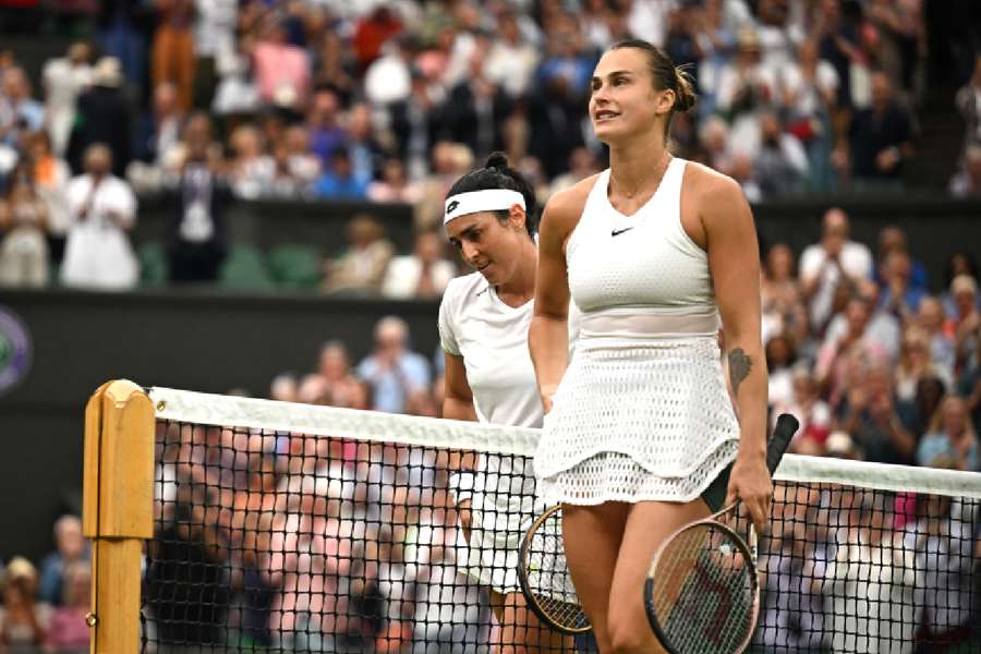 Jabeur and Sabalenka meet at the net after the match