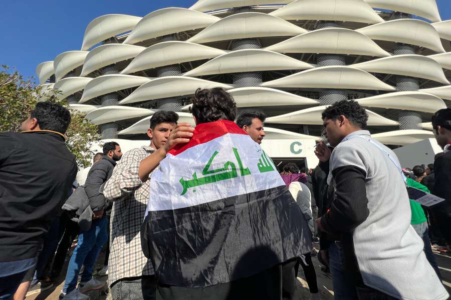 Iraq's supporters gather outside the Basra International Stadium