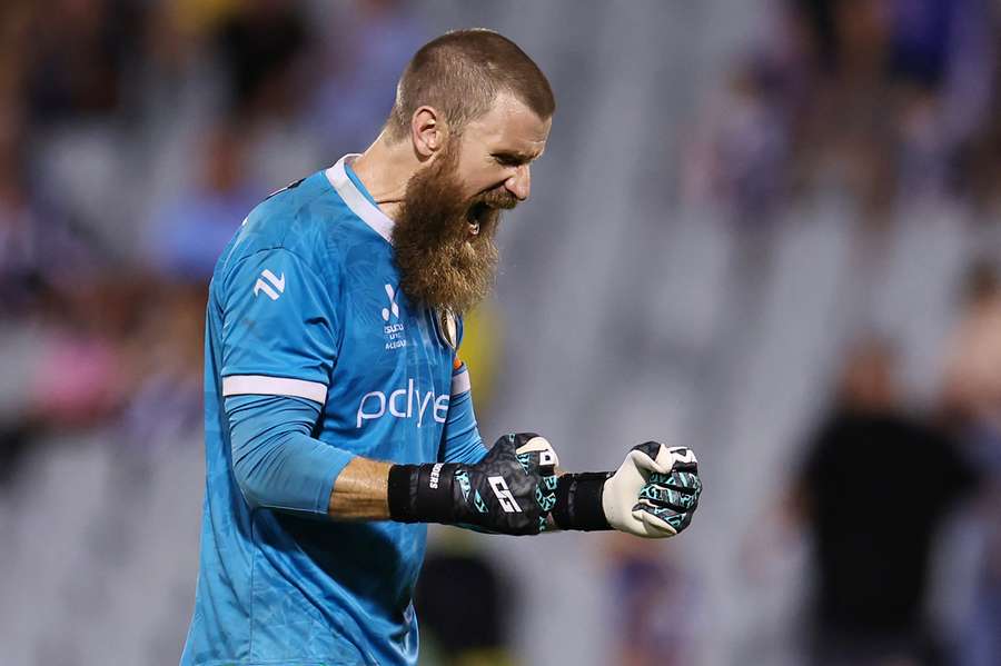 Veteran goalkeeper Andrew Redmayne celebrates the Mariners' win over Macarthur FC.