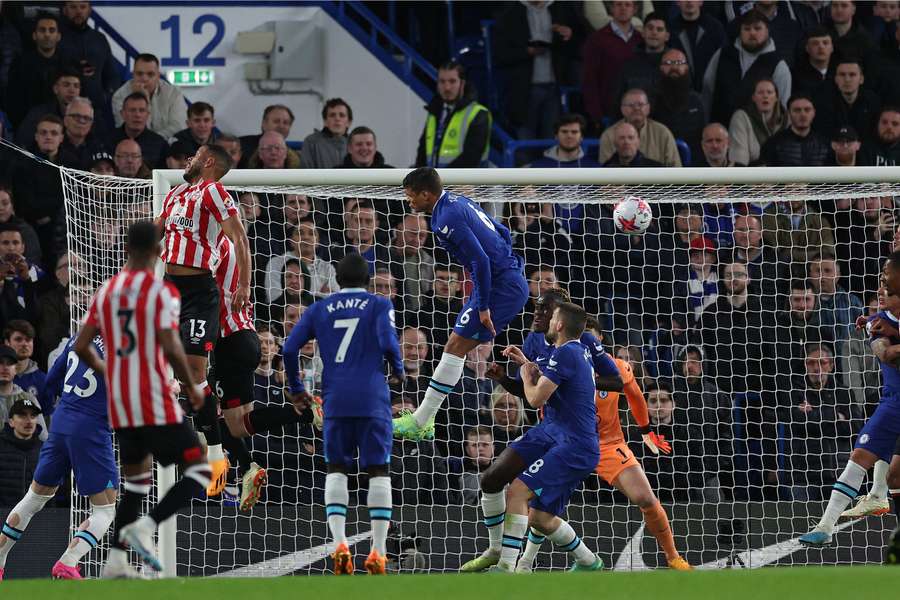 Cesar Azpilicueta can do nothing to prevent an own goal against his side